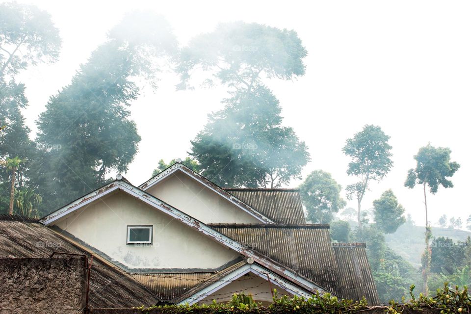 a house with a tiered triangular top.