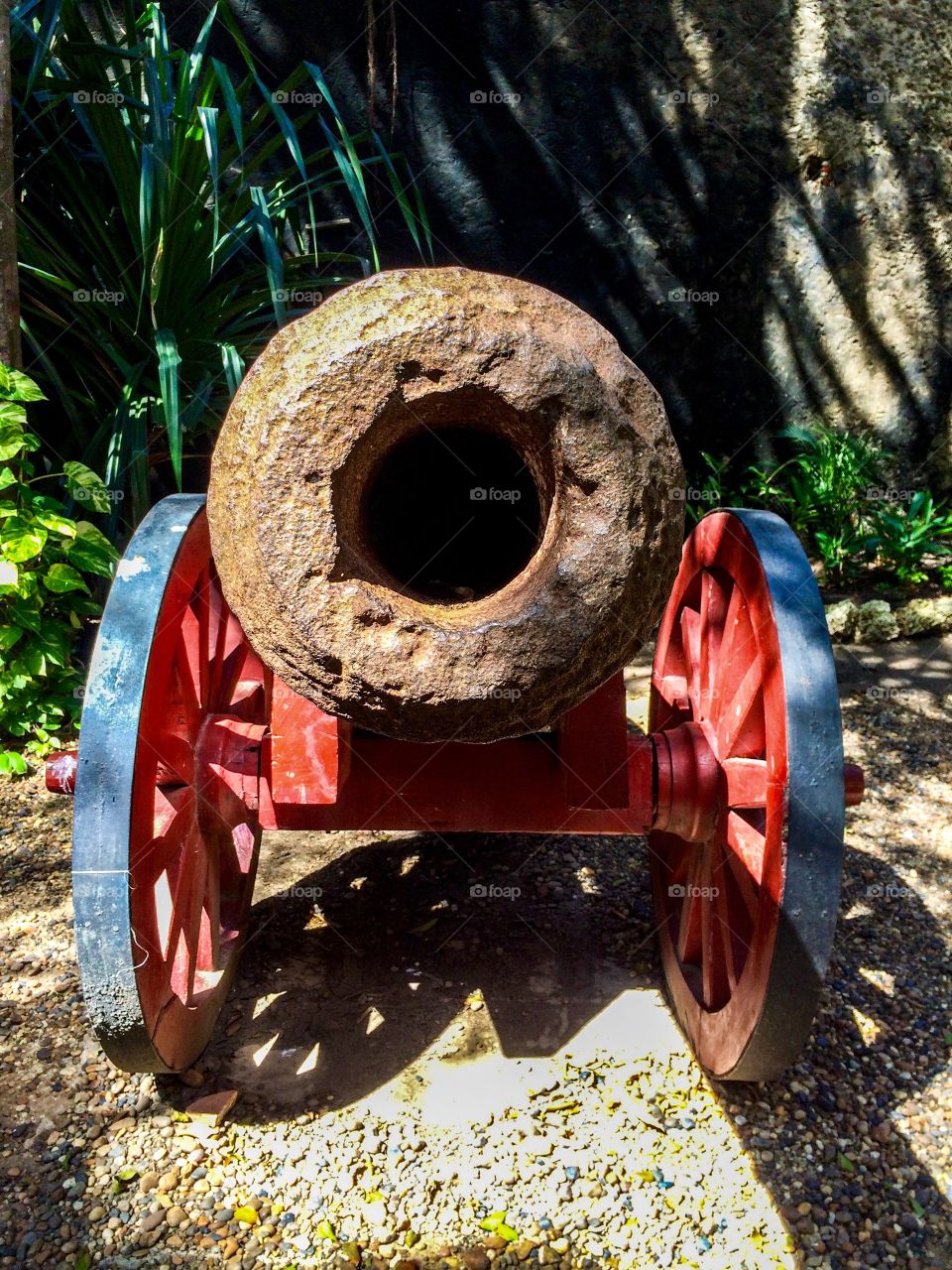 Cannon with red wheels