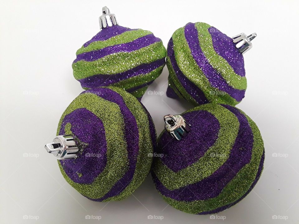 Purple and Green Christmas Ornaments Close Up