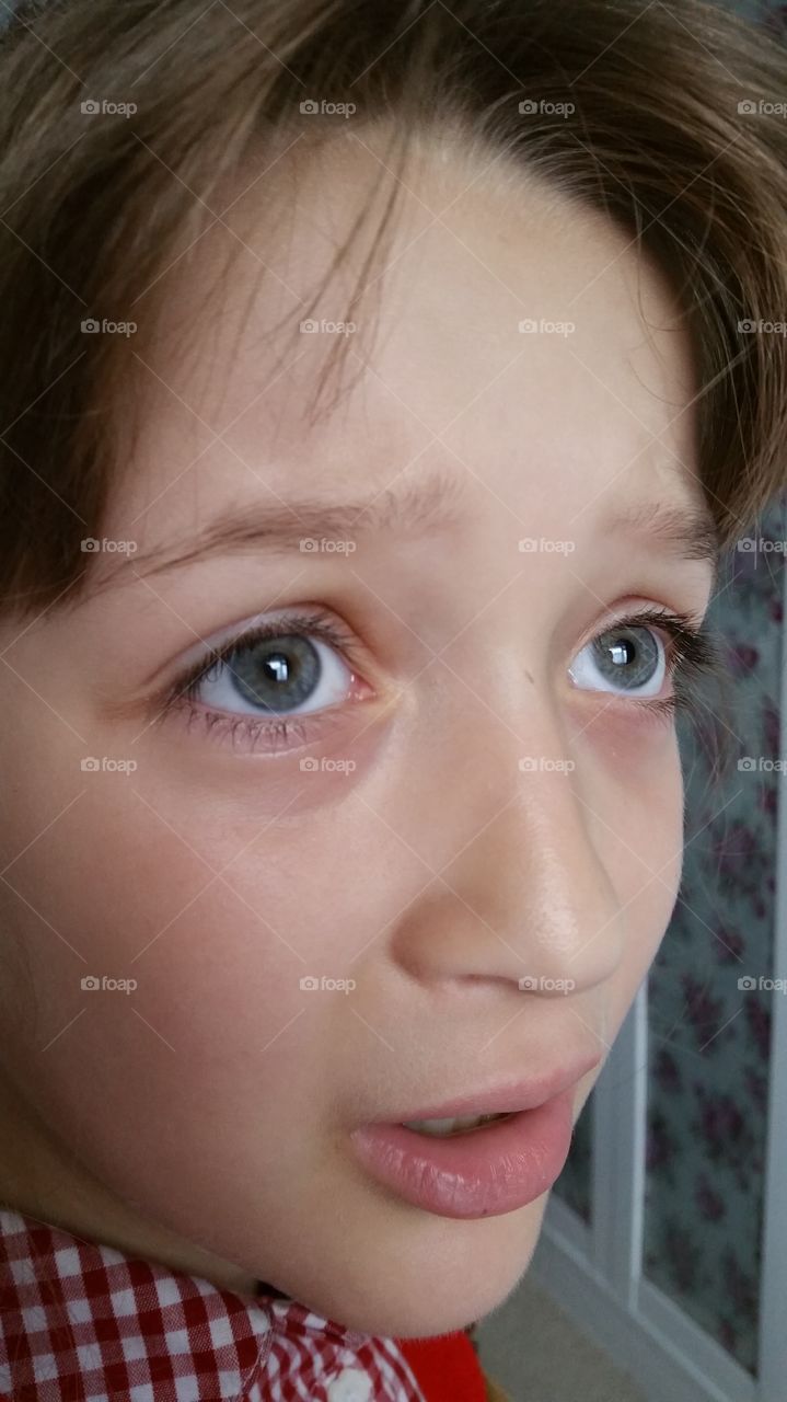 Close-up of a sad boy face 