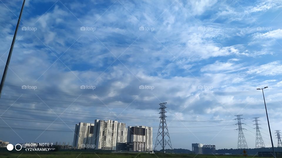Small building under cloud