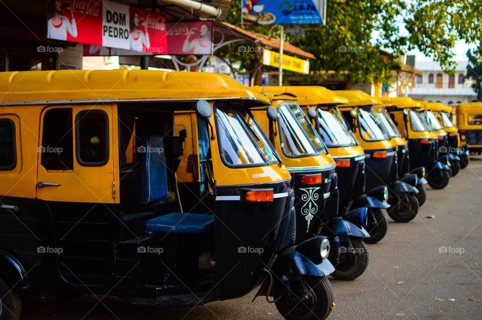 Autorickshaws parked in a line outside Vasco Railway station