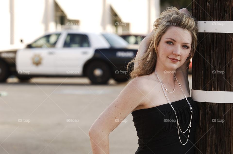 Female Model near Police Car