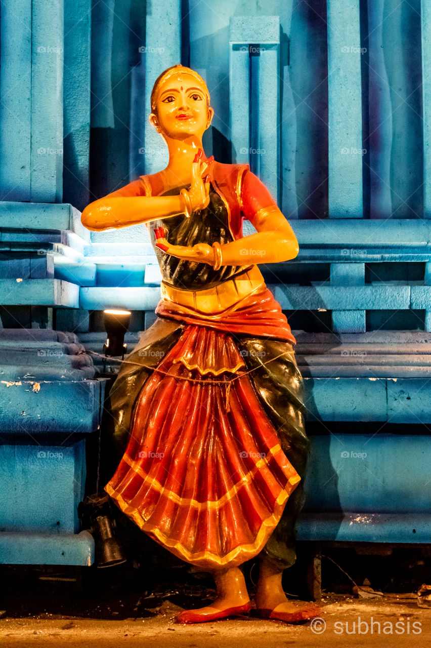 Showing the traditional Indian dance steps called Bharatnatyam