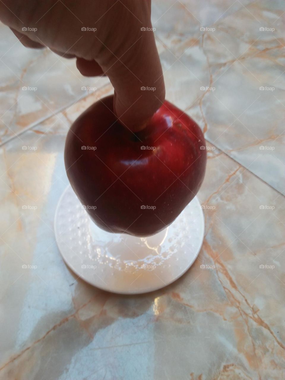 Im holding red apple.