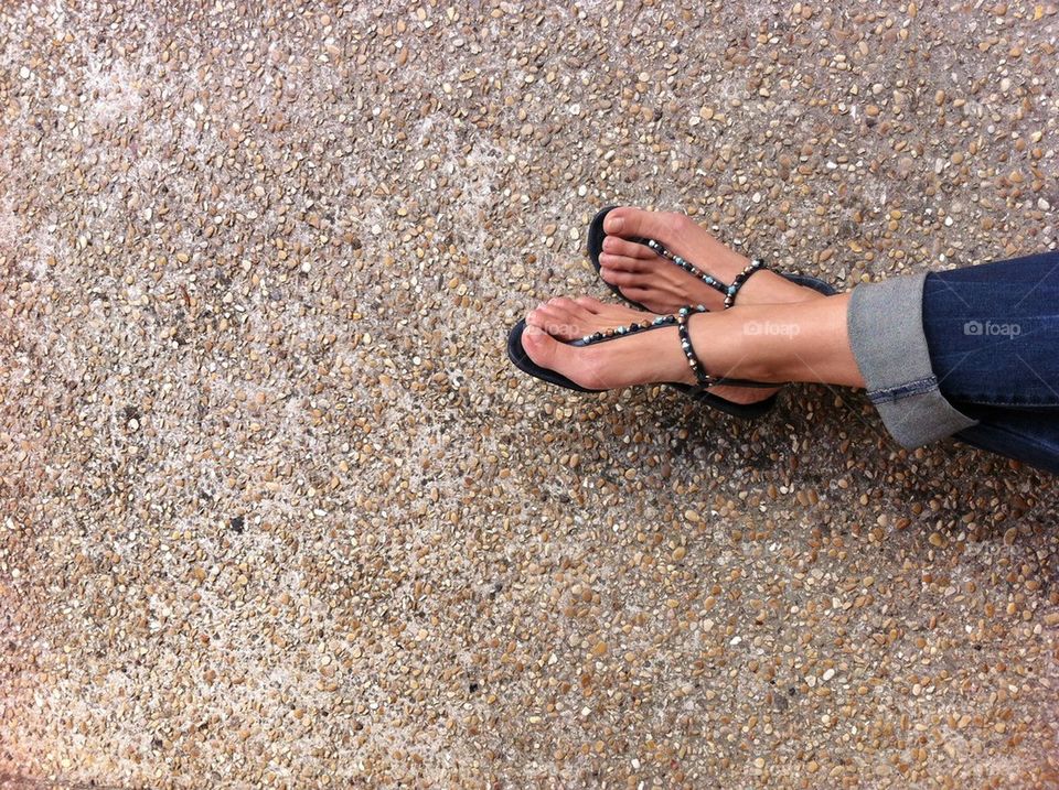 Woman's feet in summer sandals