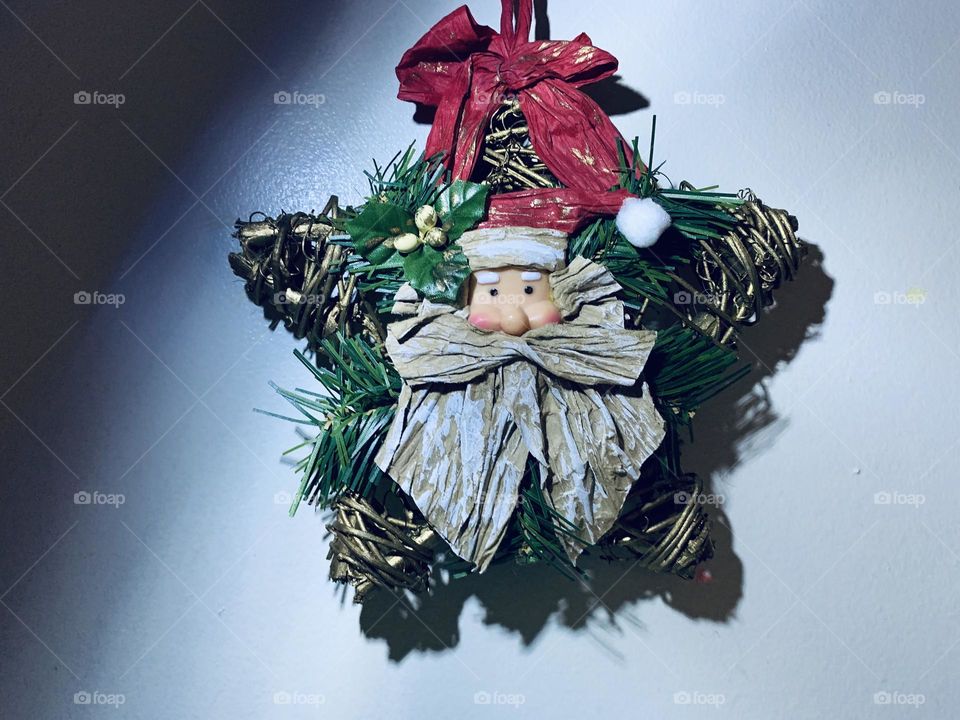 He knows when you’ve been naughty, and he knows when you’ve been taking pictures of him for Foap. 