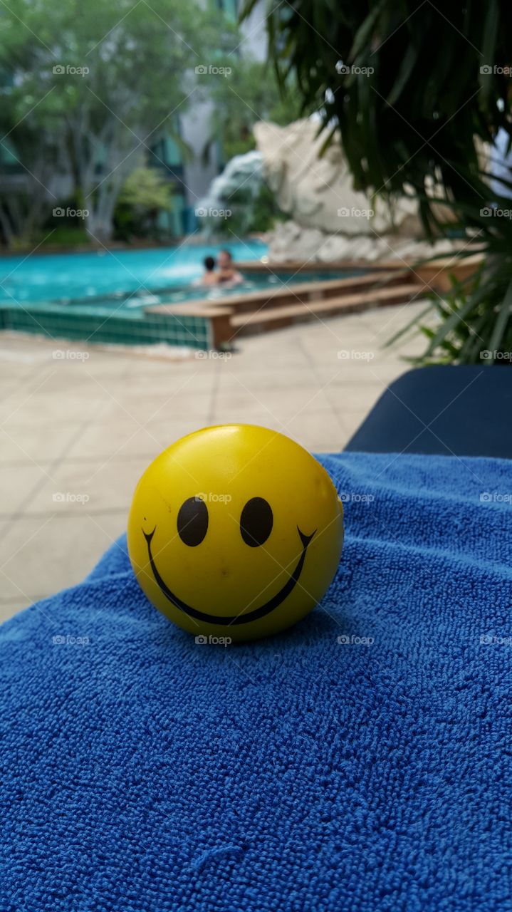 Yello smiley. at the pool