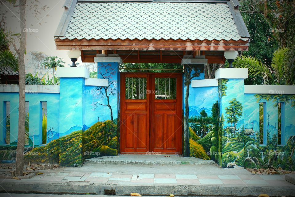 Classic wood door on the art wall. So beautiful.