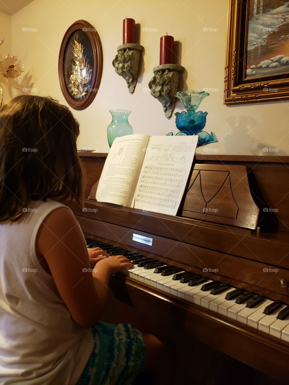 girl playing piano