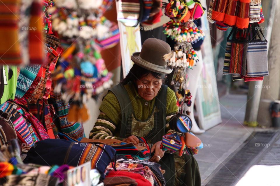 Lady merchant on an artisan street market in La-Pas, Bolivia