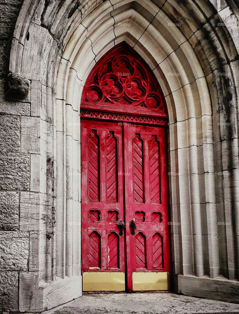 Big red door on an old church