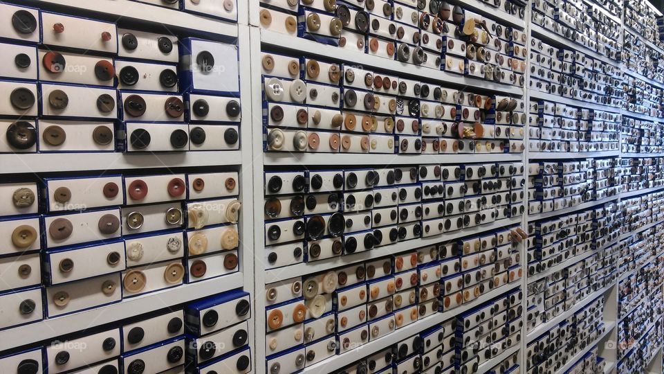 Many buttons in cloth shop