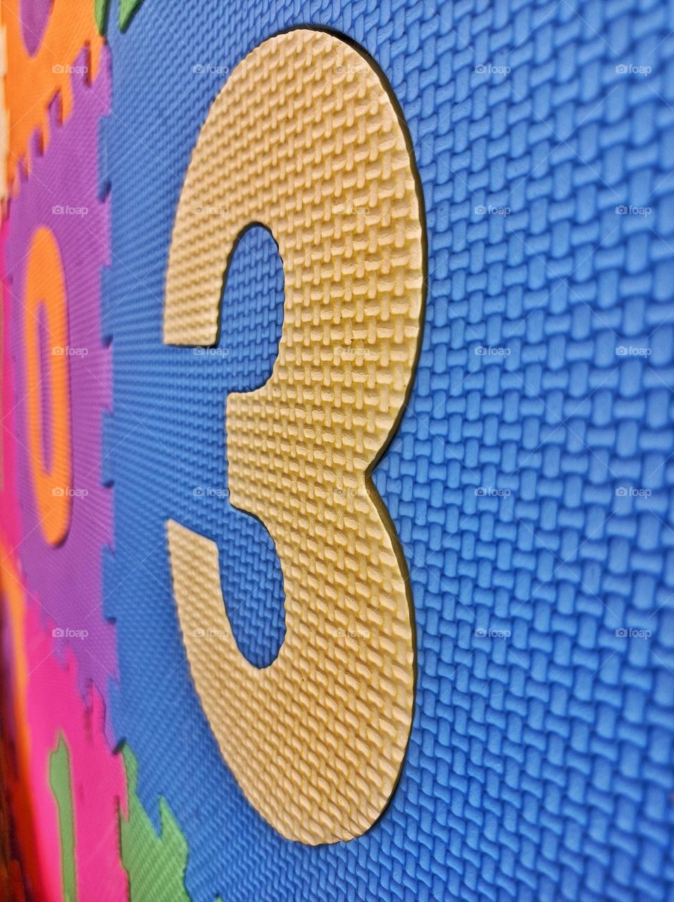 Number three yellow on blue  background