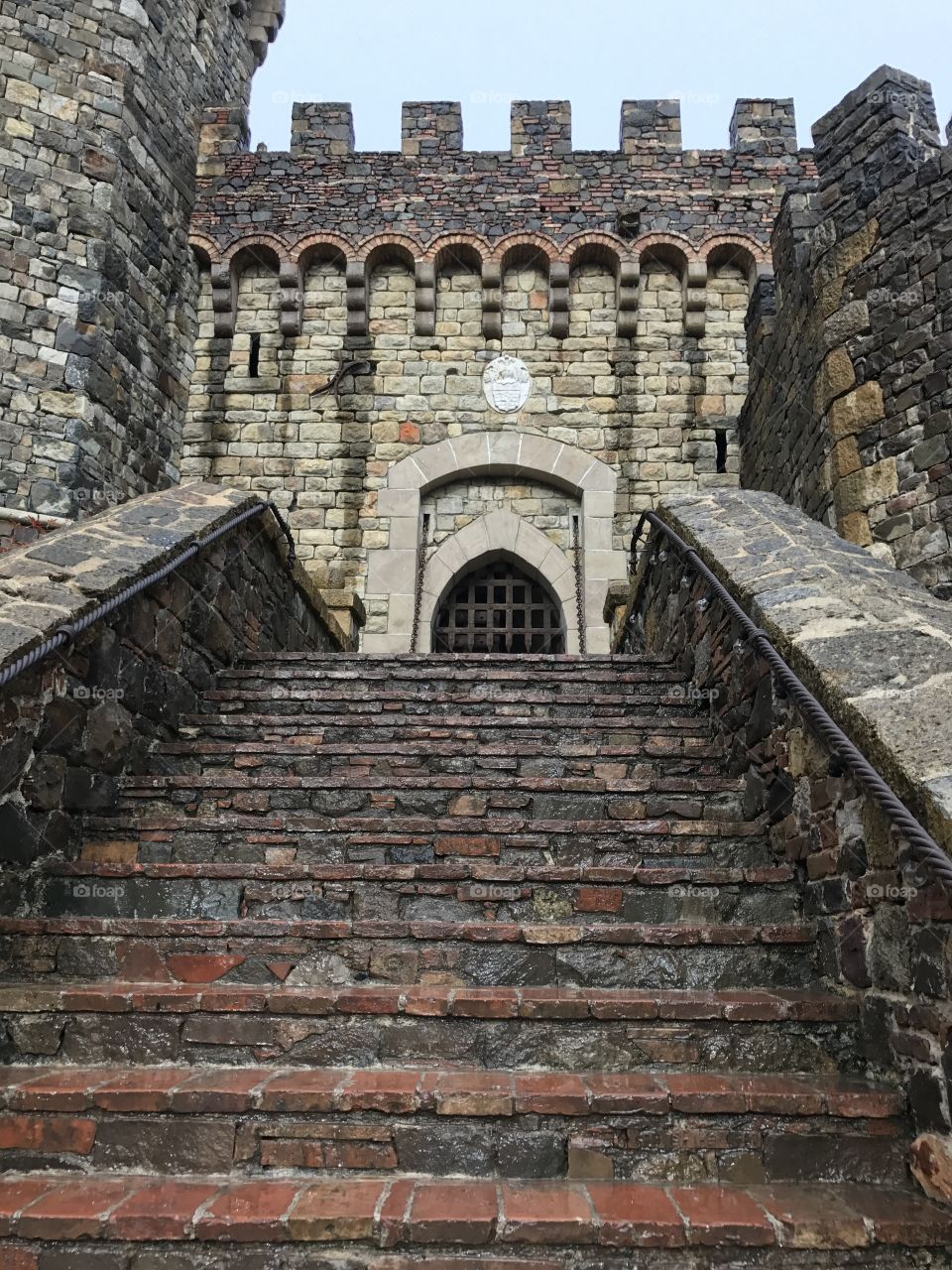 Stairs going up to the gate for castello di amorosa