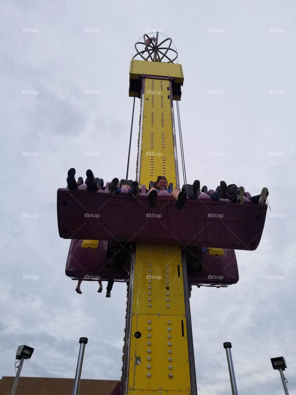 fair picture. daughter on a ride..adrenaline  rush.