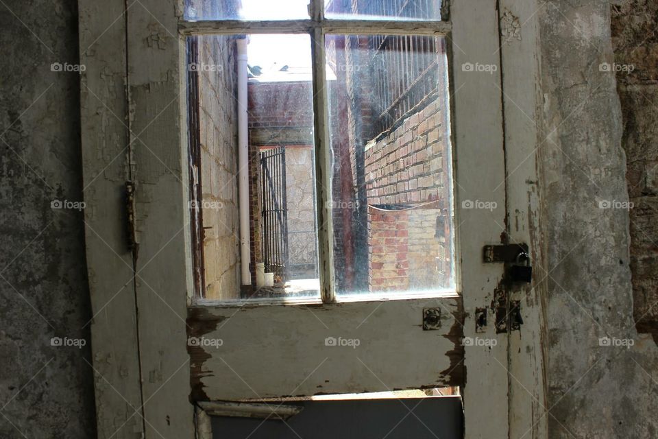view through windows door in abandoned jail