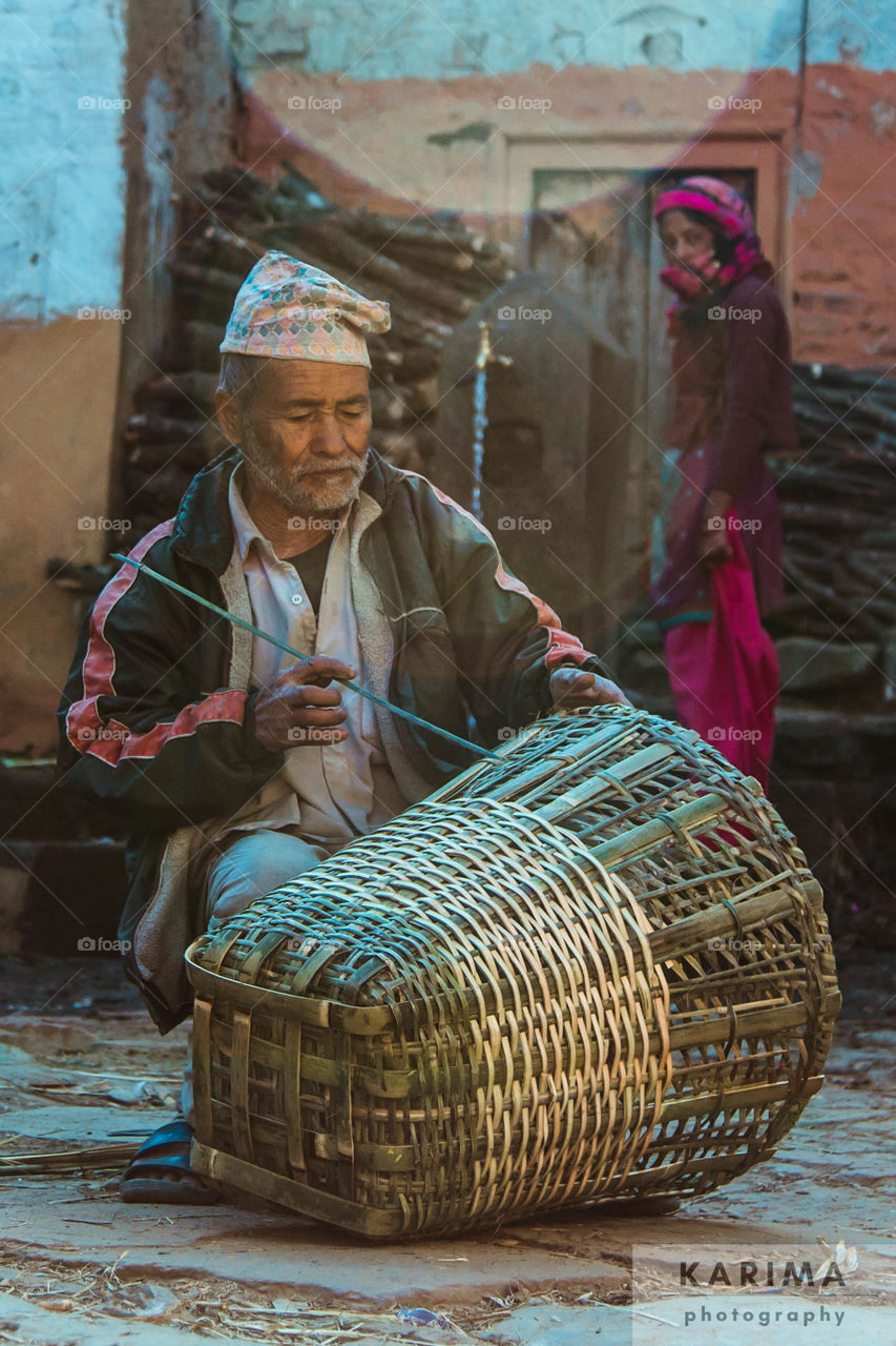 Nepali Man making DoKo
from Tistung