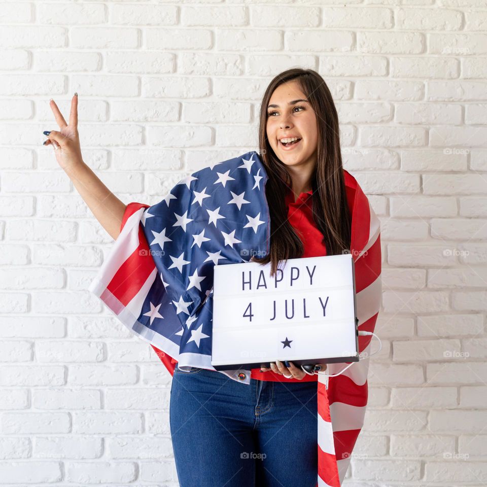 woman holding USA flag