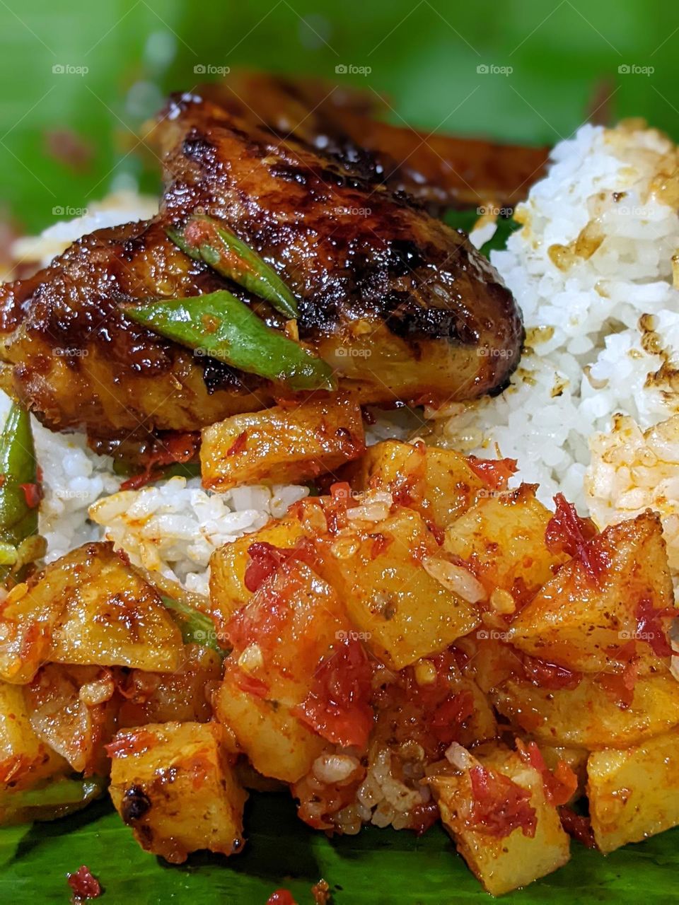 sweet soy sauce chicken rice and balado potatoes.🤤