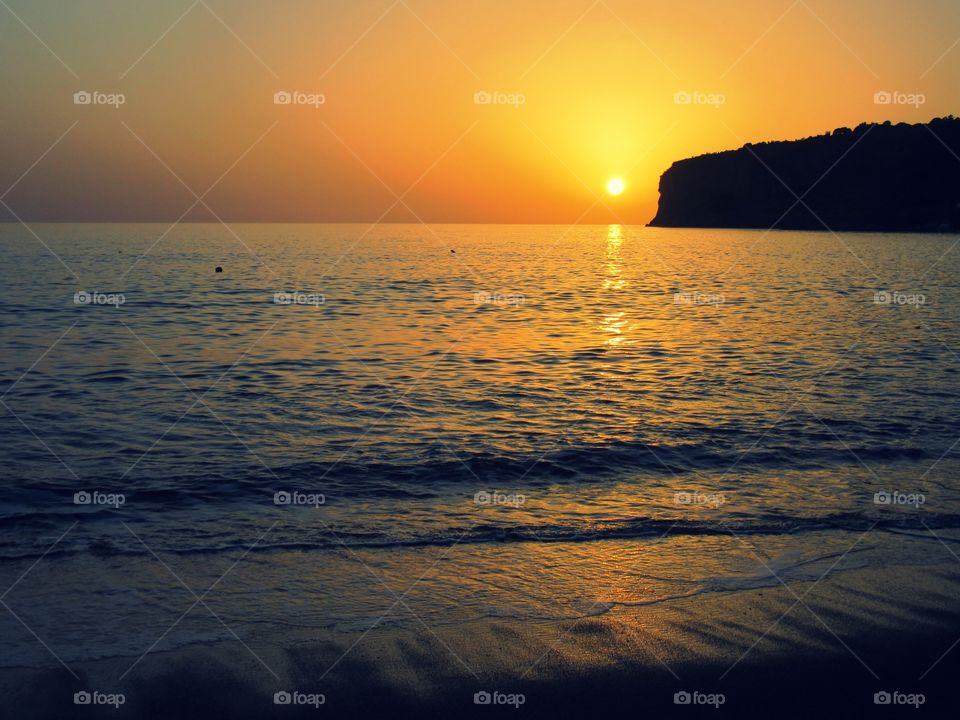 Sunset over Praia ( Italy ).