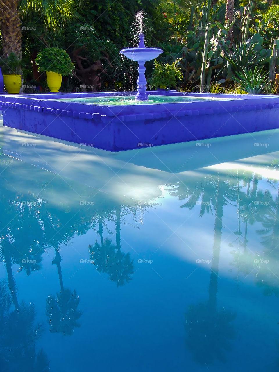 Blue fountain. Jardine Majorelle. Marrakesh. Morocco.