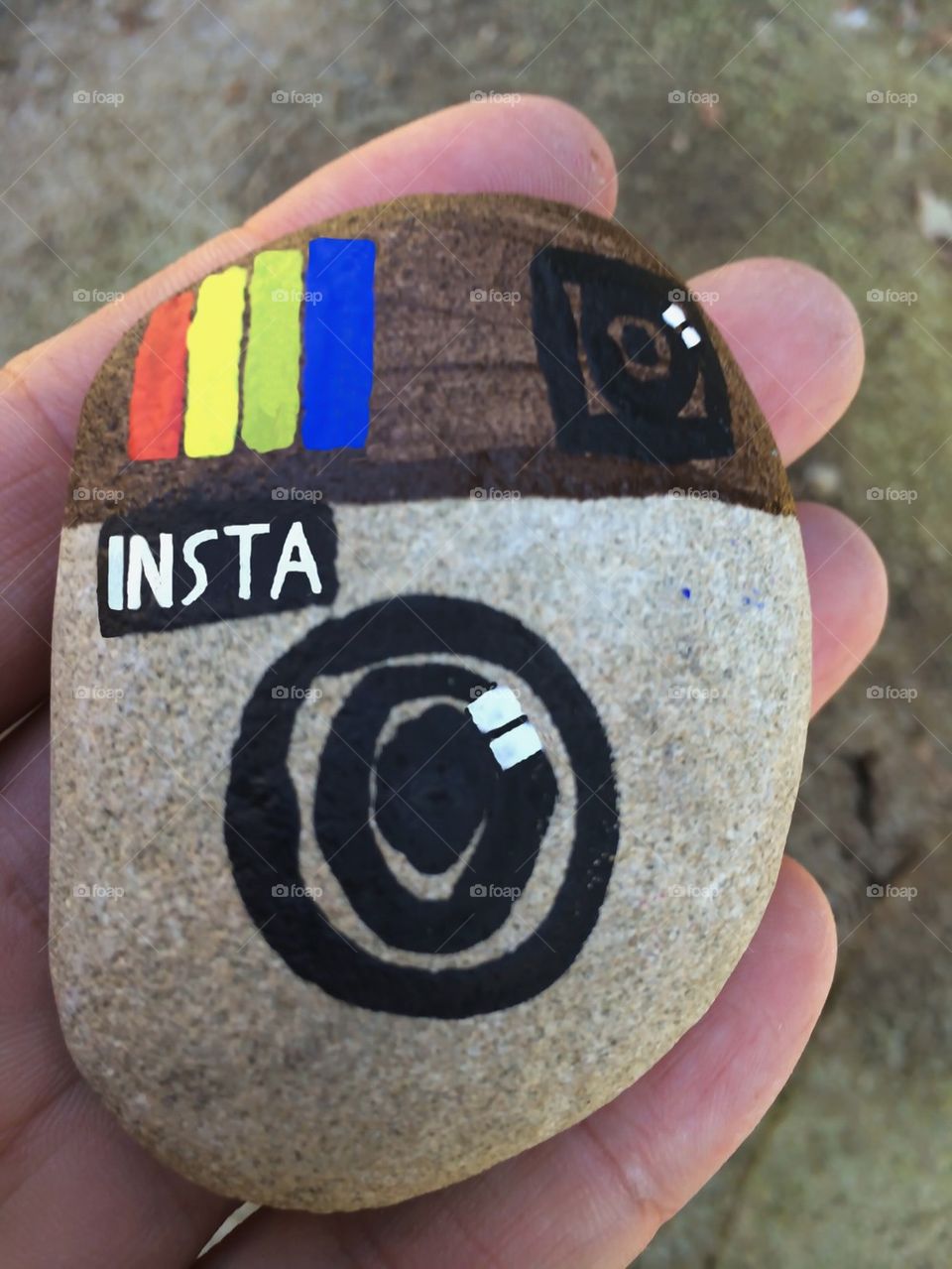Instagram symbol on a stone