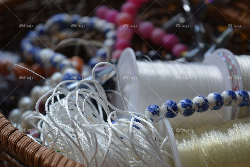 Sewing material in wooden basket