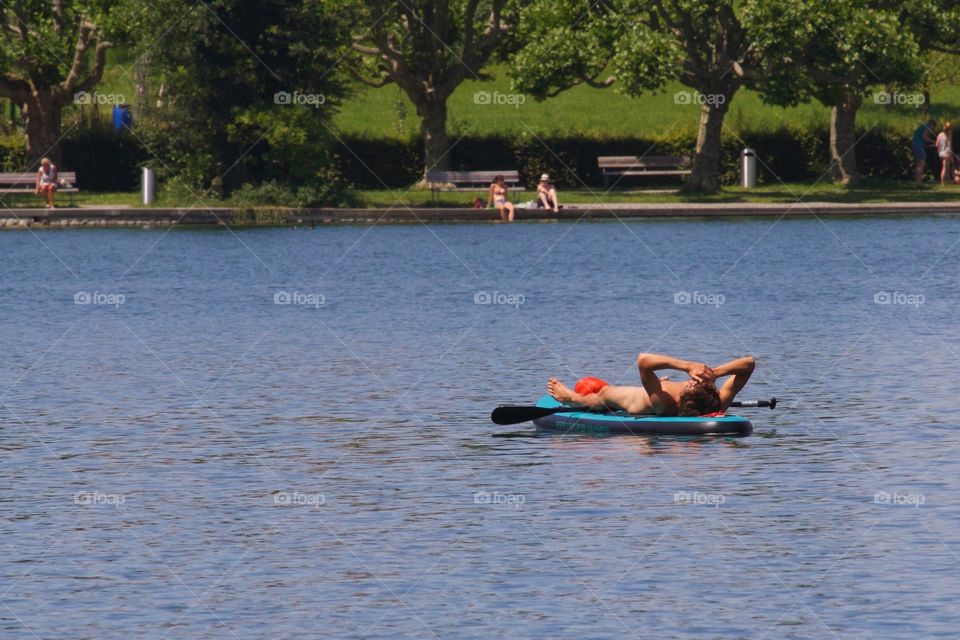 Naked Guy Catching A Tan At Sempach Lake