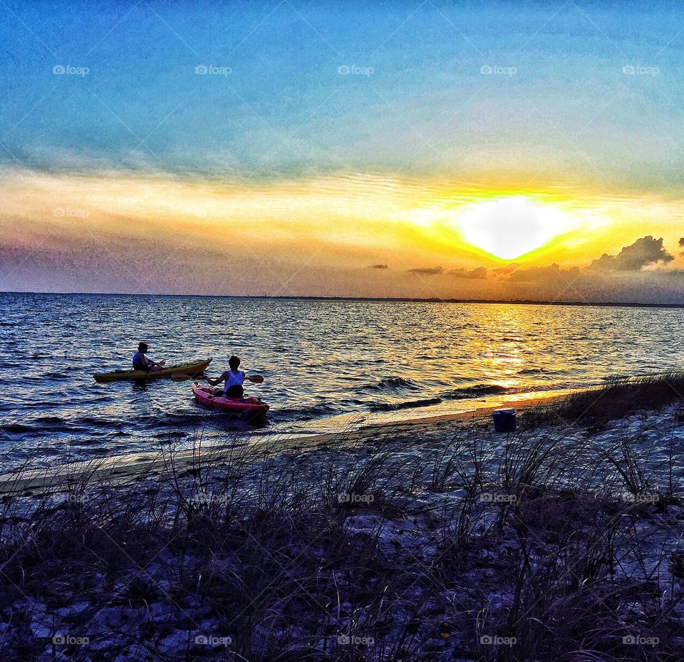 Couple kayaking in the bay