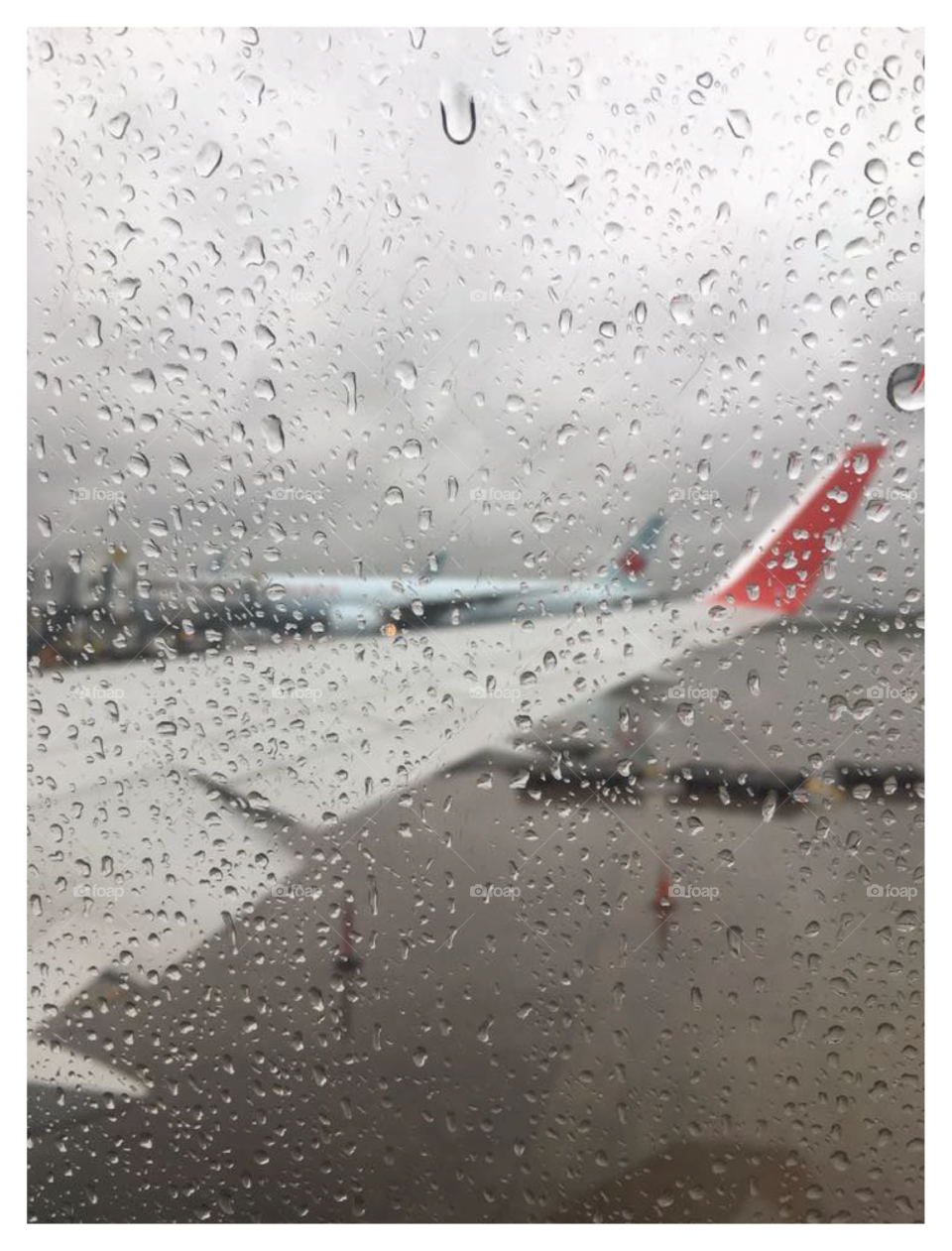 Plane wing in Rain