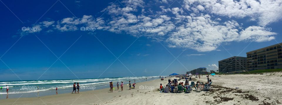 Beach day, alligator cloud formation in the sky