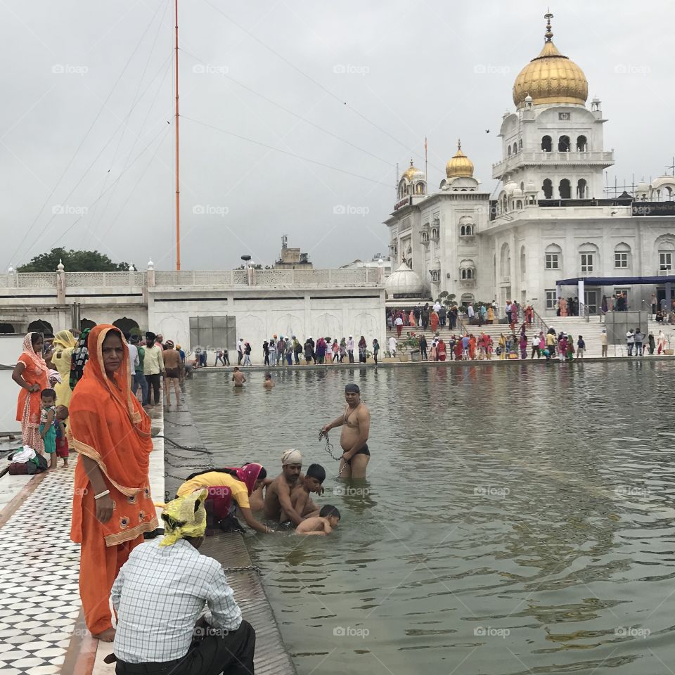 Bathing in gurudwara bangla sahib