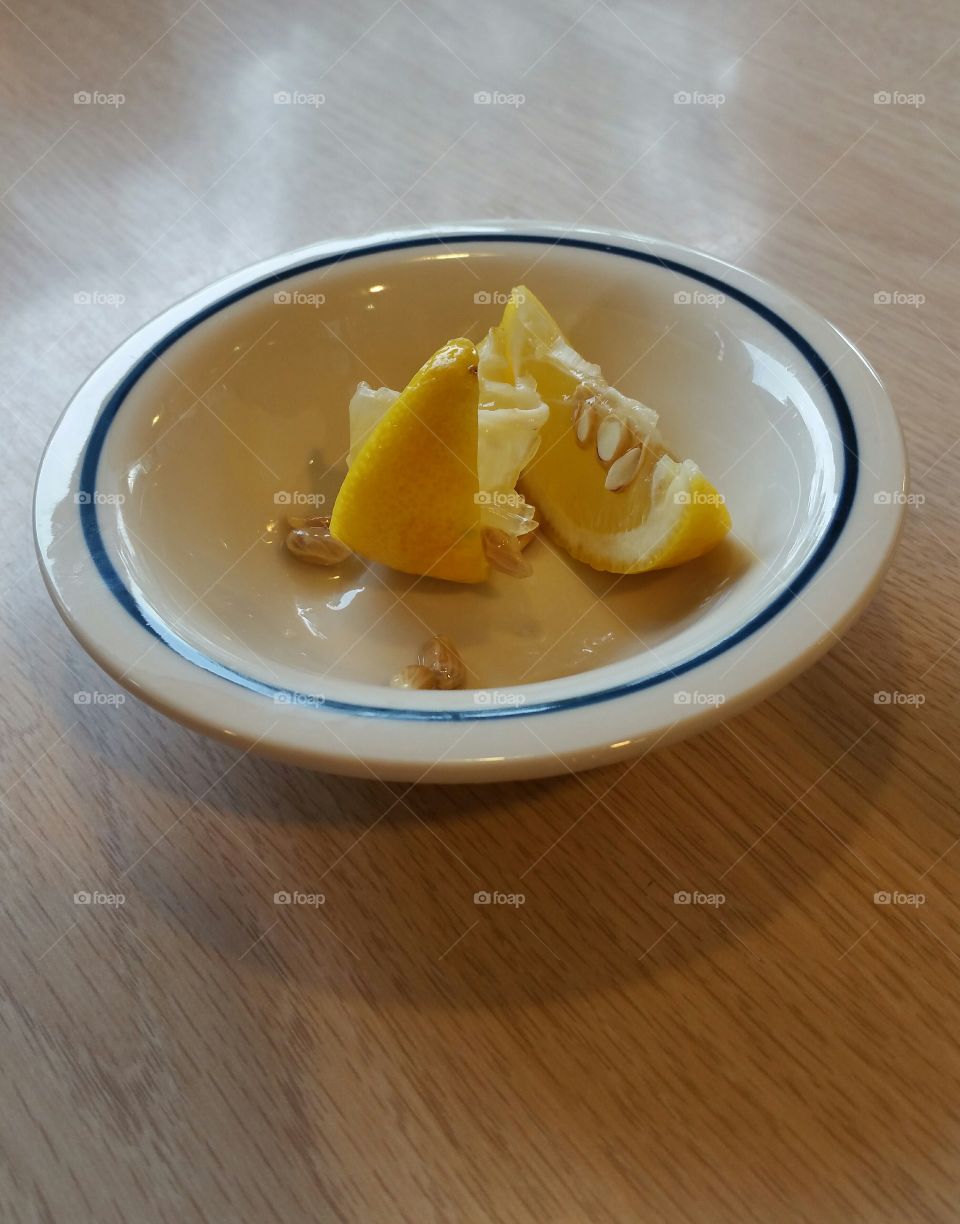 bowl of lemon wedges