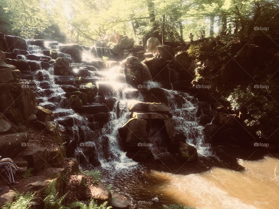 The Cascades waterfall at Virginia Water, Surrey, in Spring.