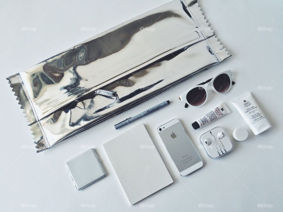 In my bag with white stuff . What's in your bag?
In my bag with white and silver stuff with composition prop styling 