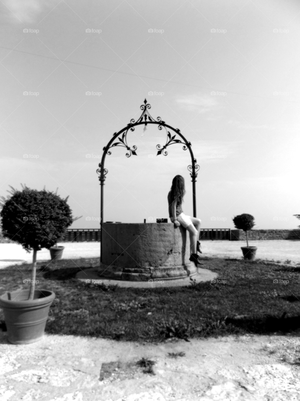 The girl and the well