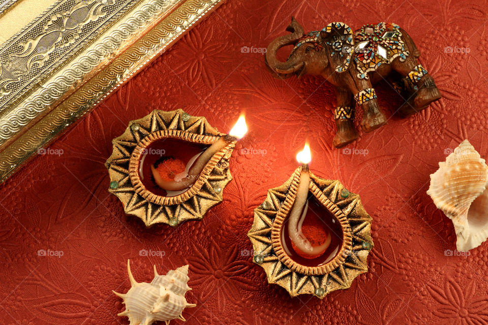 Indian festival Diwali diya oil lamp with decorations