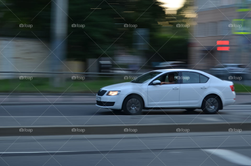 Car in motion with the open window