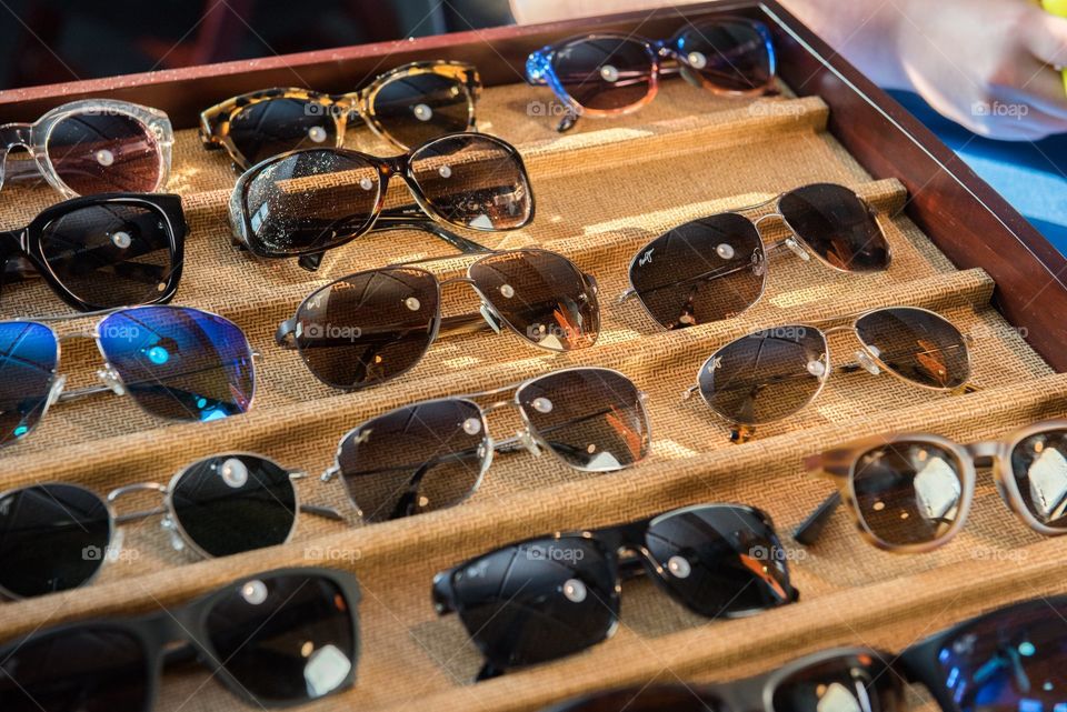 Maui Jim sunglasses on display at a corporate event 