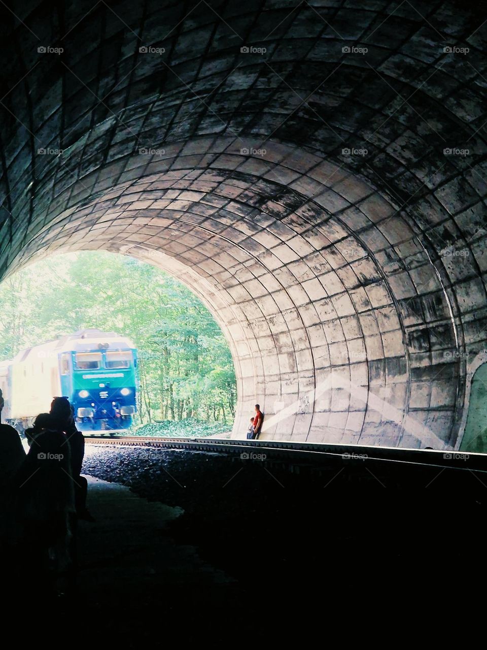 the train's entrance into the tunnel