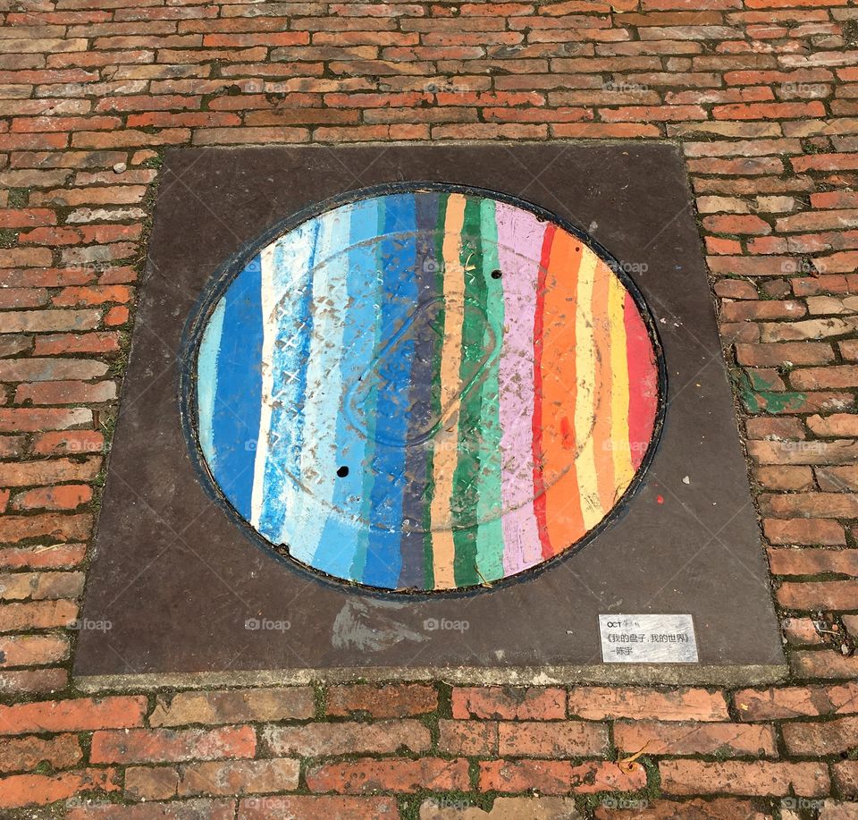 Manhole Cover Painted in Rainbow Colours - Shenzhen, China