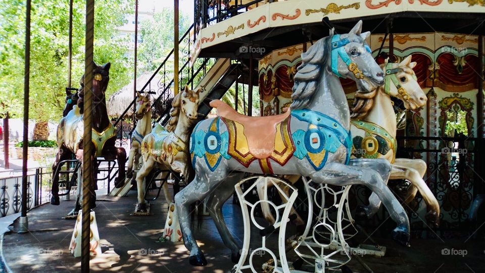 Merry-go-round, Carousel, Children’s play and fun 