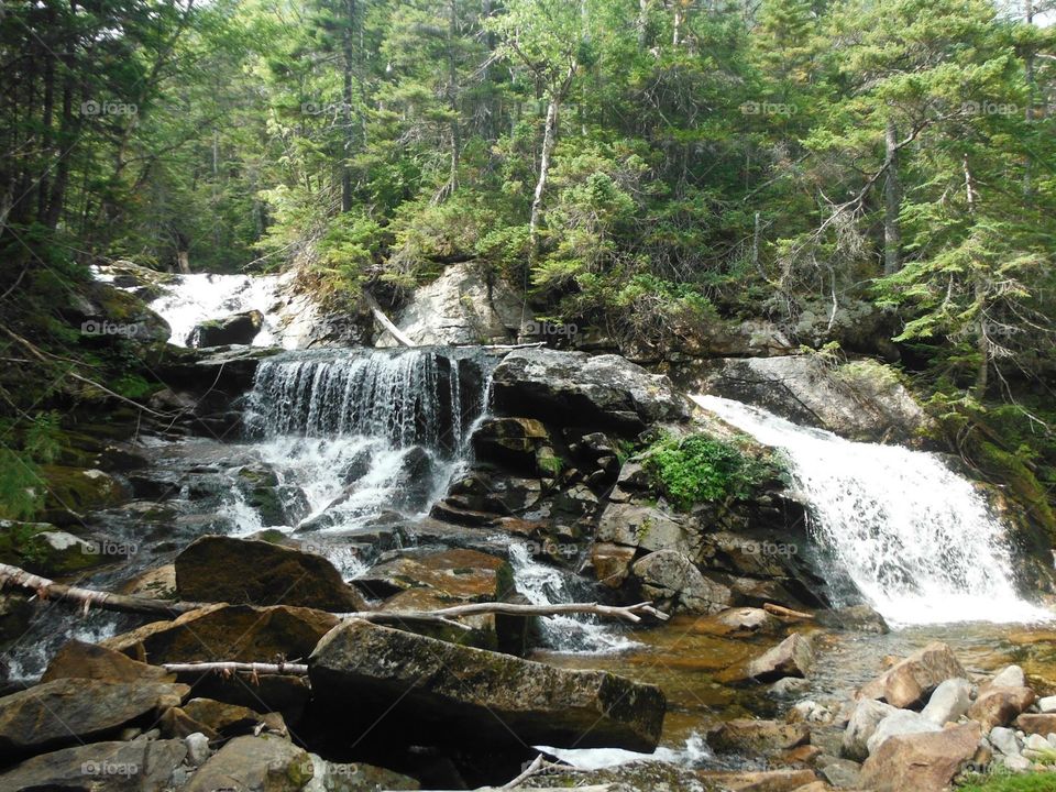 Waterfall. In white mountains
