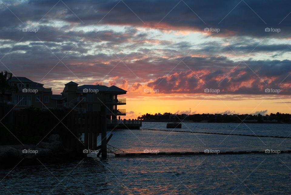 View of building at coastline at dusk