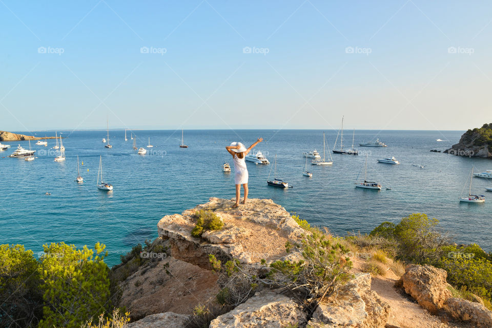 Women standing on rock