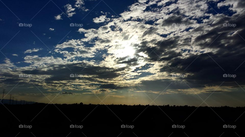 Desert Sun and Clouds