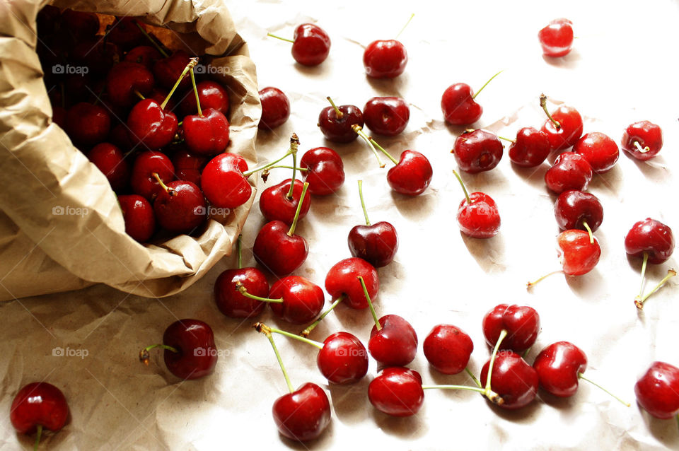 Cherries in a paper bag