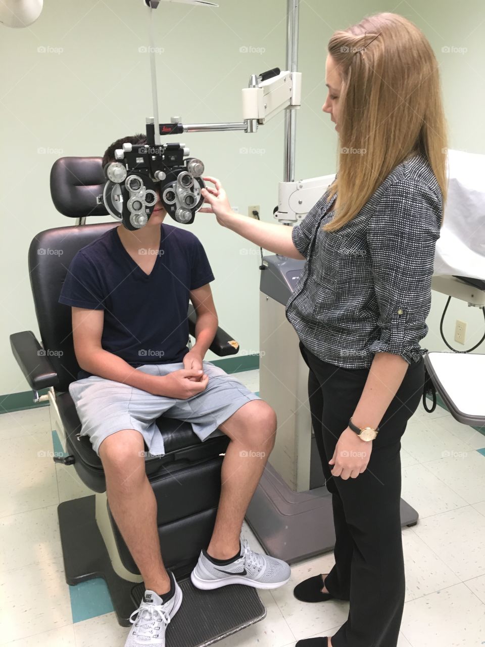 Teenage boy doing eye test