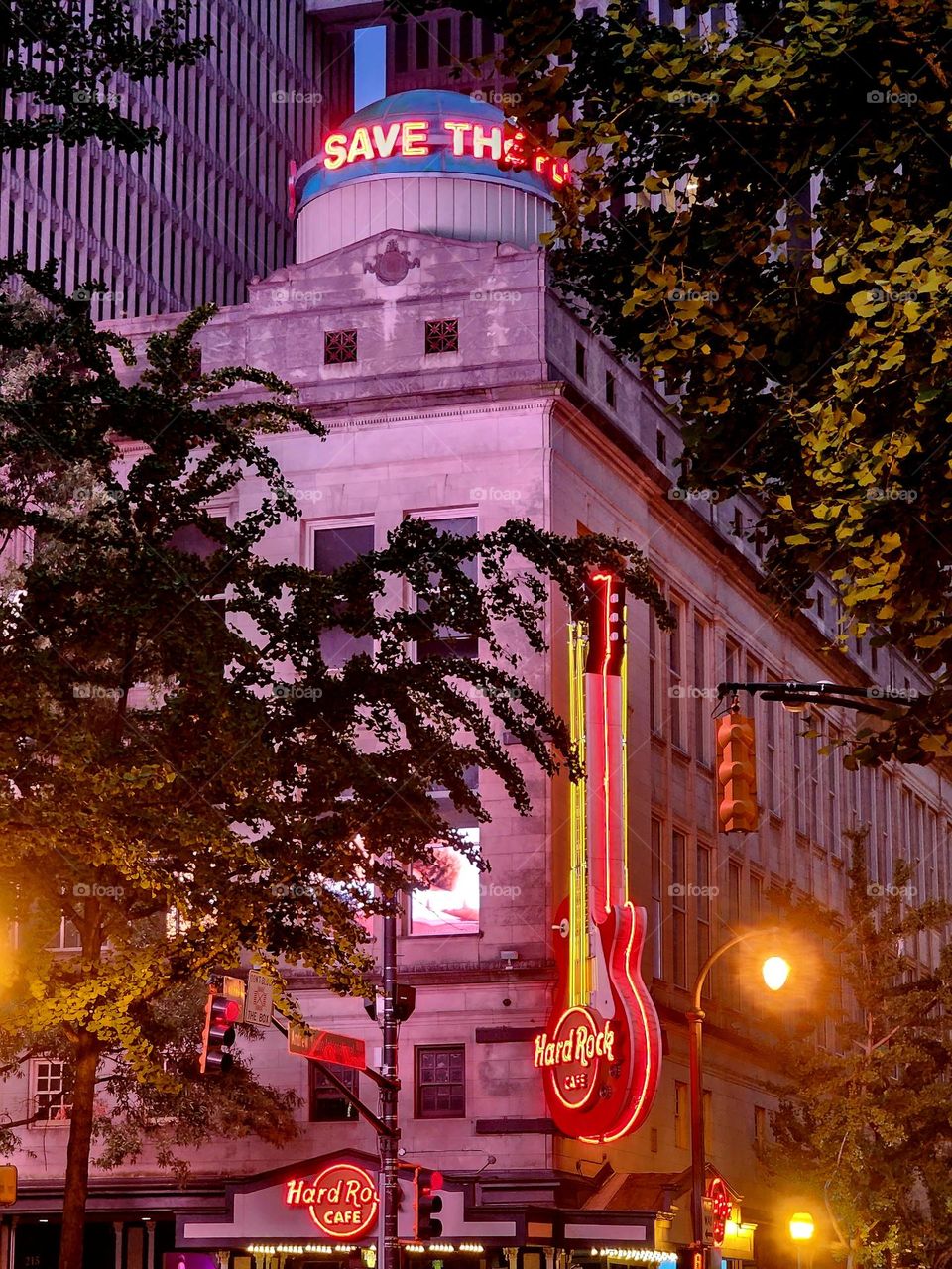 The Hard Rock Cafe in Atlanta is located in a beautiful older building offset with flashy neon signage